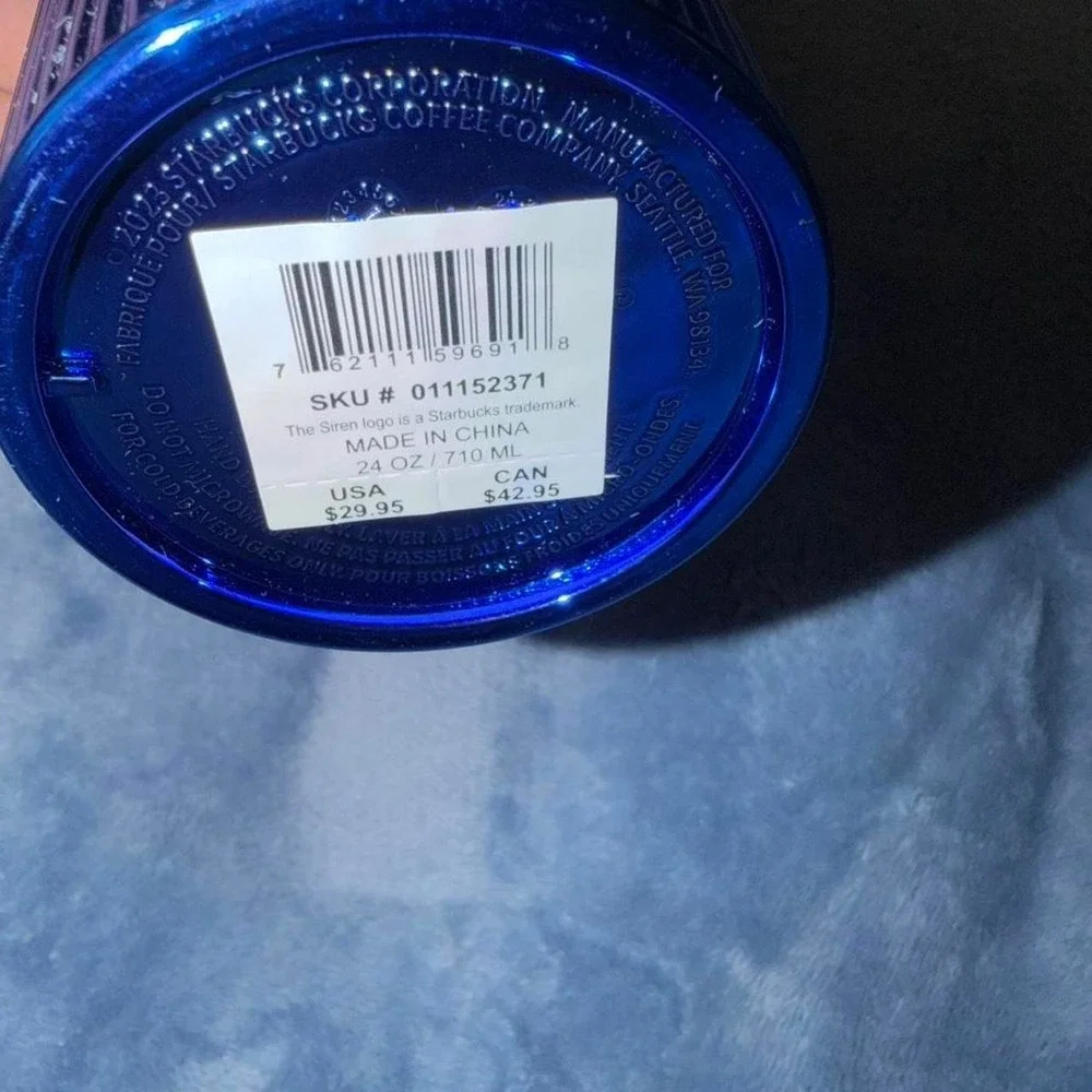 Blue Starbucks tumbler with straw